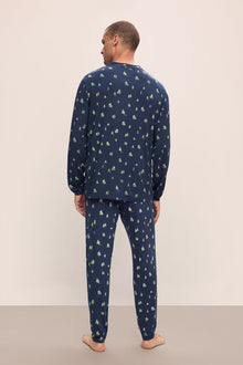 Model wears Henry Printed TENCEL Modal Long PJ Set in Woodland Pine Navy/Ivory.