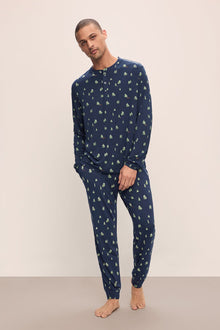 Model wears Henry Printed TENCEL Modal Long PJ Set in Woodland Pine Navy/Ivory.