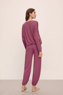 Model wears Gisele TENCELâ„¢ Modal Slouchy PJ Set in Raspberry/Ivory.