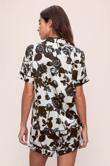 Model is wearing Inez Washable Silk Printed Short PJ Set in Rose Memoire Pearl/Black