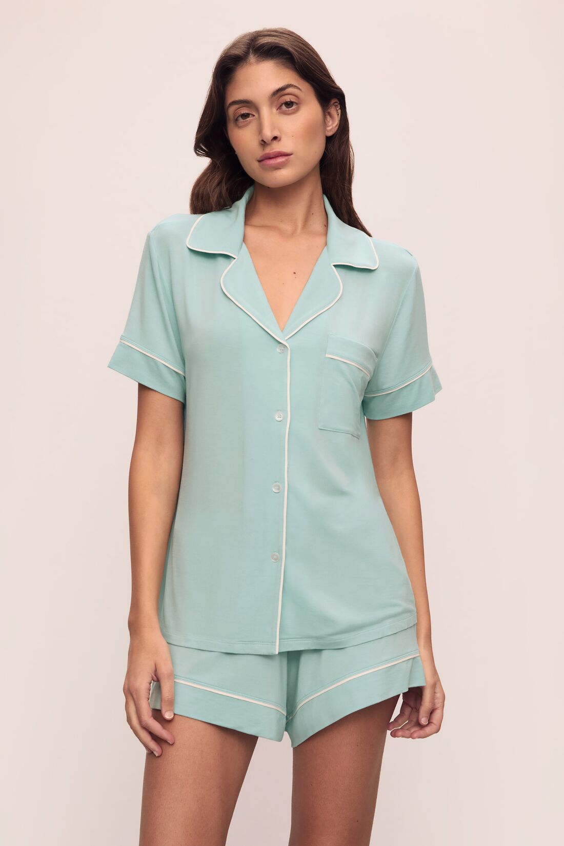 Model is wearing Gisele TENCEL Modal Relaxed Short PJ Set in Canal Blue/Ivory