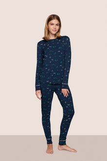 Model is wearing Gisele Printed TENCEL Modal Crewneck PJ Set in Forest Pine Navy/Ivory