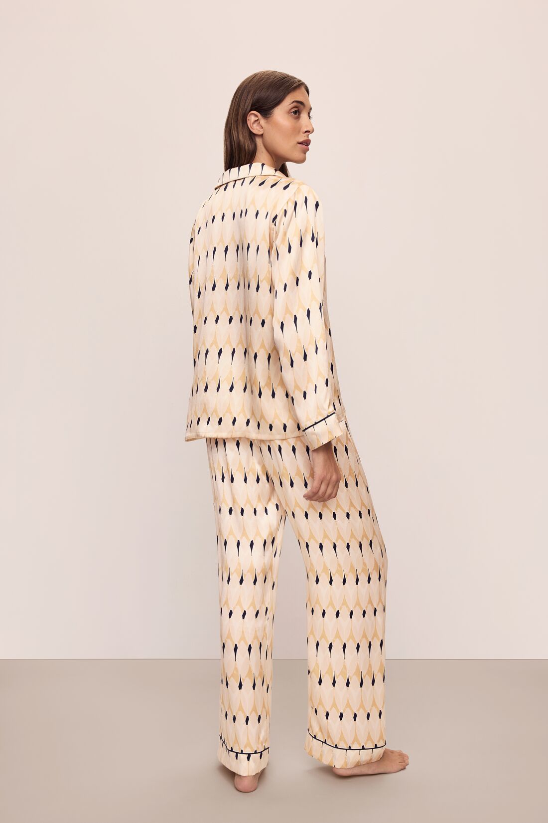 Model wears Inez Washable Silk Printed Long PJ Set in Leaves Boulder/Navy.