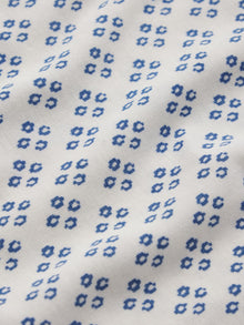 Model wears Gisele TENCEL Printed Modal Ruffle Cami & Shortie Short Set in Petite Batik Ivory/Denim Blue.