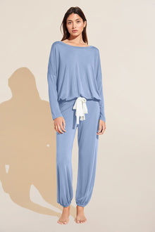Model wears Gisele TENCELâ„¢ Modal Slouchy PJ Set in wedgewood blue/ivory.