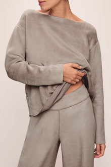 Model wears Reversible Plush High Waist Pant in Toffee.