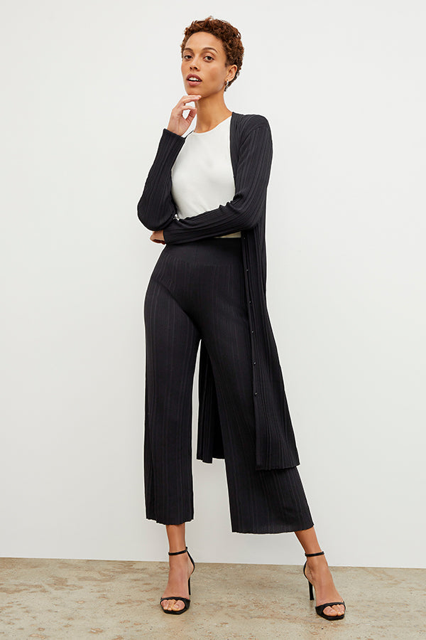 Front image of a woman wearing the Marijane Pant - Textured Knit in Black | Exclude