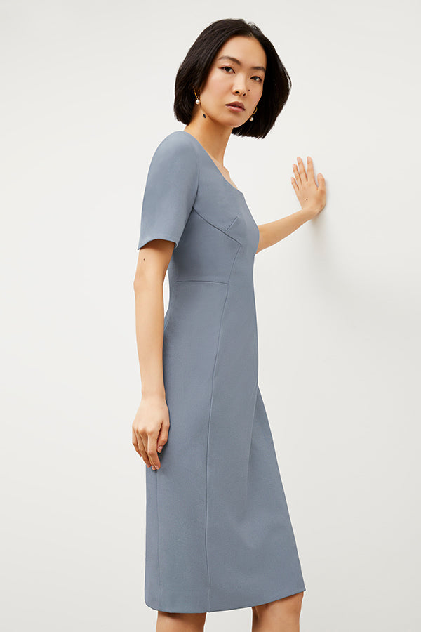 Side image of a woman wearing the Noa Dress - Recycled Wondertex in Steel Blue | Grid Hover | Exclude