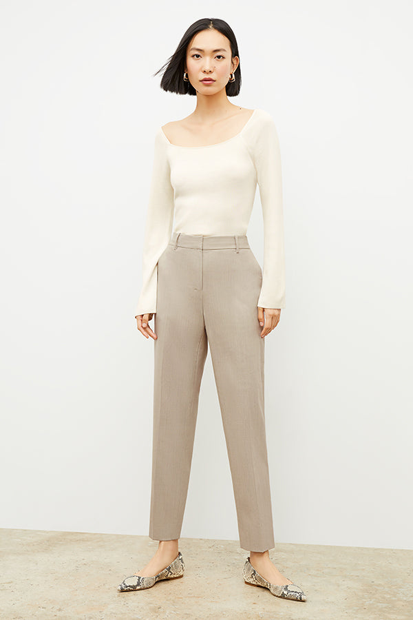 Front image of a woman wearing the Joya Top in Cream | Exclude