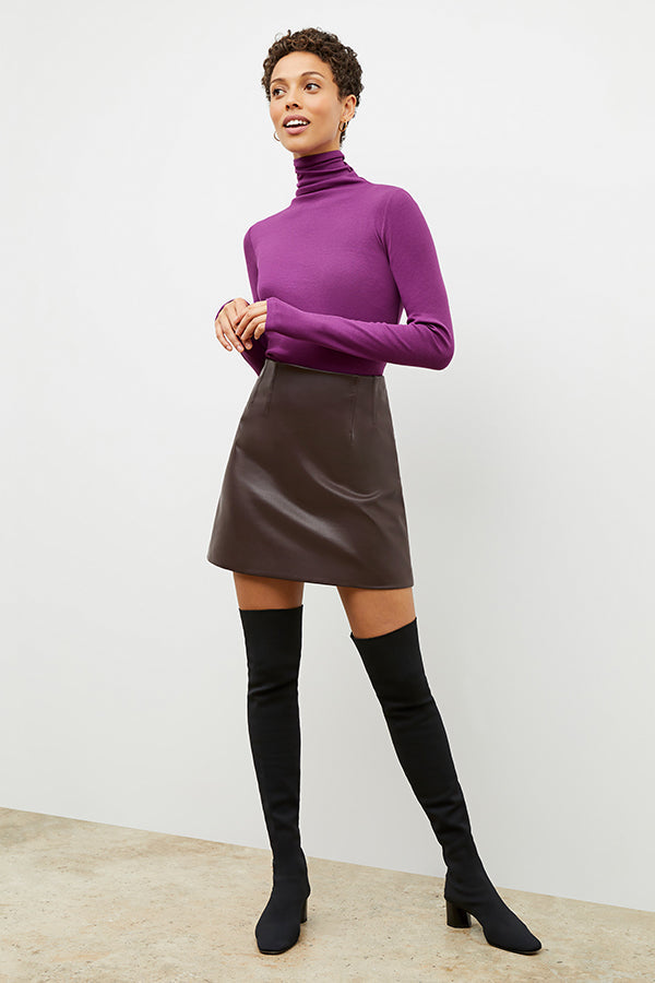 Front image of a woman wearing the nina boot in black | Exclude