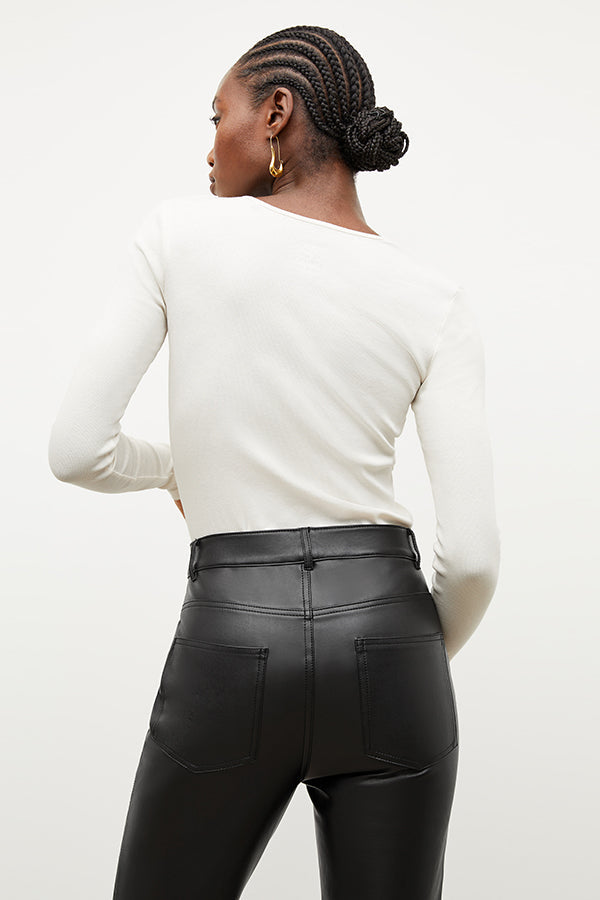 Front image of a woman wearing the archie pant in black | Exclude