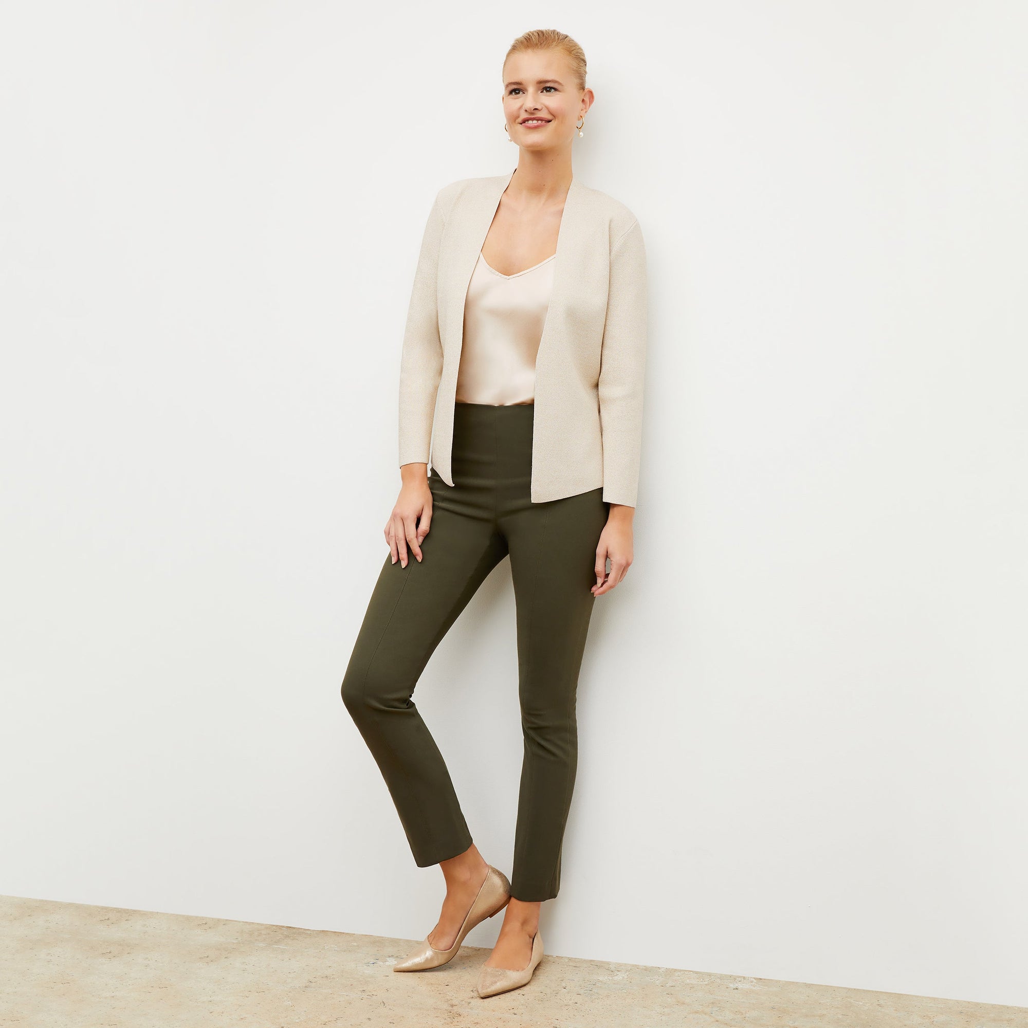 front image of woman wearing foster pant in dark olive | Exclude