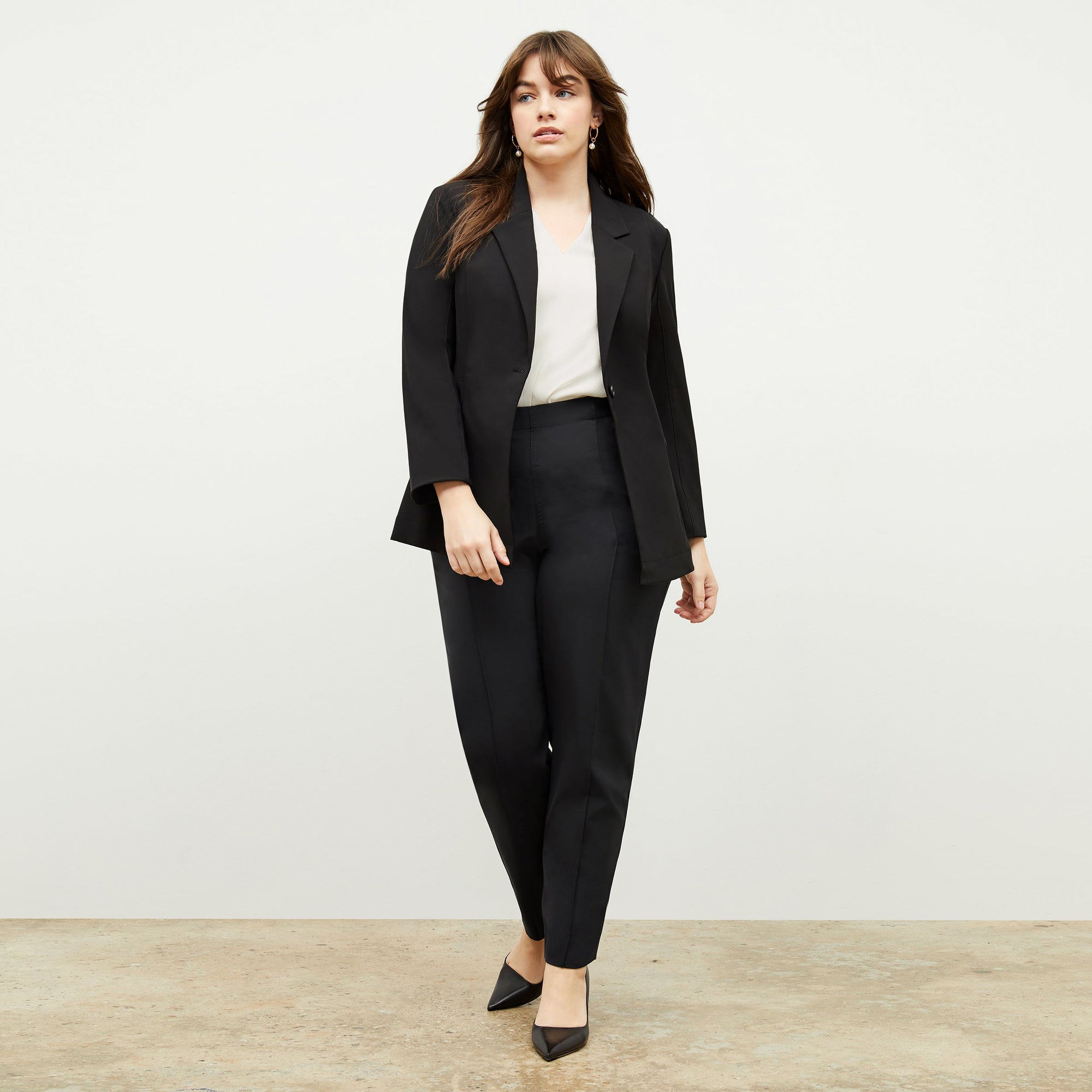 Front image of a woman standing wearing the Colby Jogger in Black