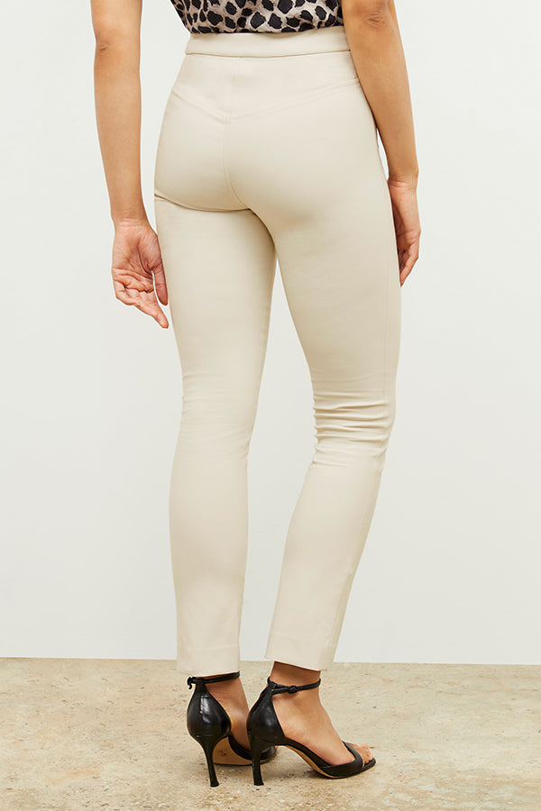 Front image of a woman standing wearing the foster pant in bone | Exclude | Grid Hover
