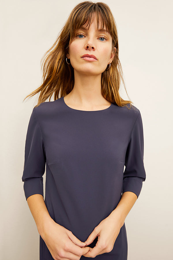 front image of a woman wearing the lancia dress in cool charcoal | Exclude | Grid Hover