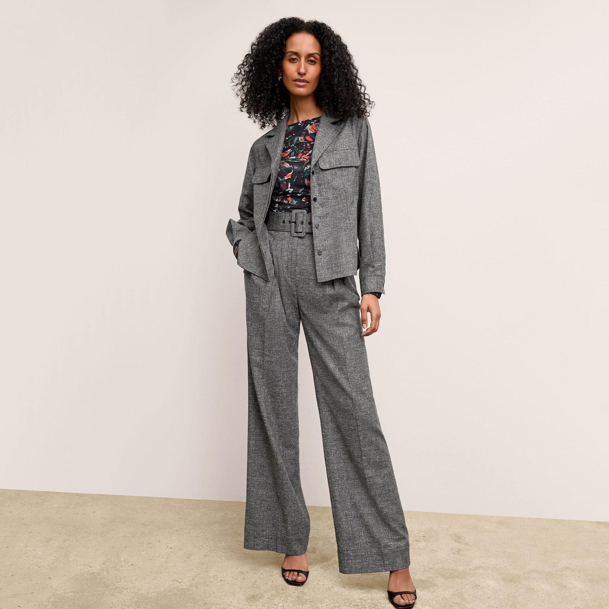 front image of a woman wearing the natalia jacket in black/white