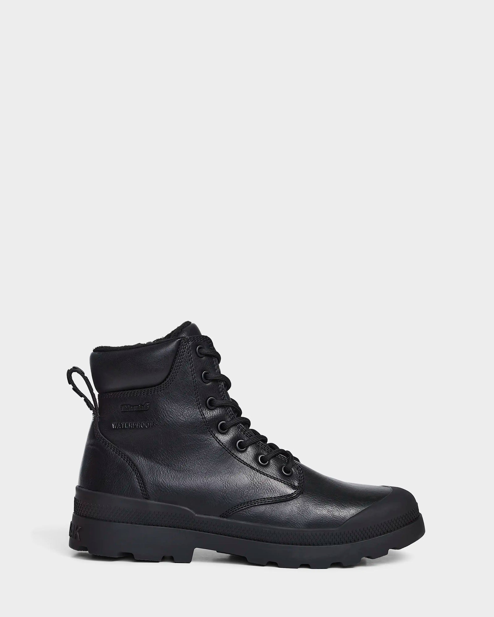 The Rudsak ARTUR - M223501 Black is a black mid-calf lace-up boot with a rugged rubber sole, pull tab, and "WATERPROOF" embossed on the side. Made from weather-treated leather, shown in profile against a white background.