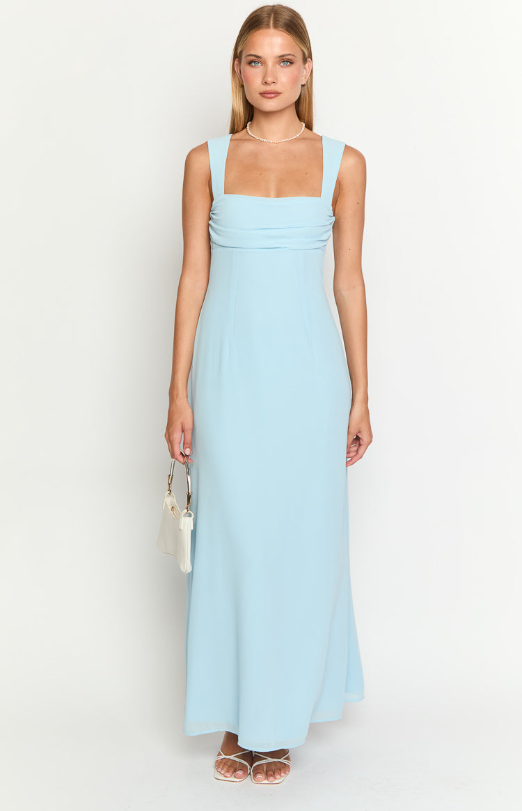 Light blue maxi dress with a square neckline, wide straps, and ruched detail on the bust