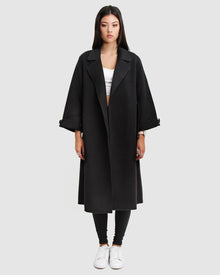 Oversized-wool-coat-black-front_a8f3dde4-db3b-416d-b62f-b440ee8d86c4.jpg