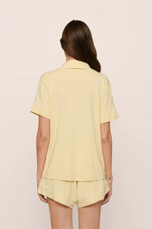 Model is wearing Gisele TENCEL Modal Relaxed Short PJ Set in  Sunrise/Ivory