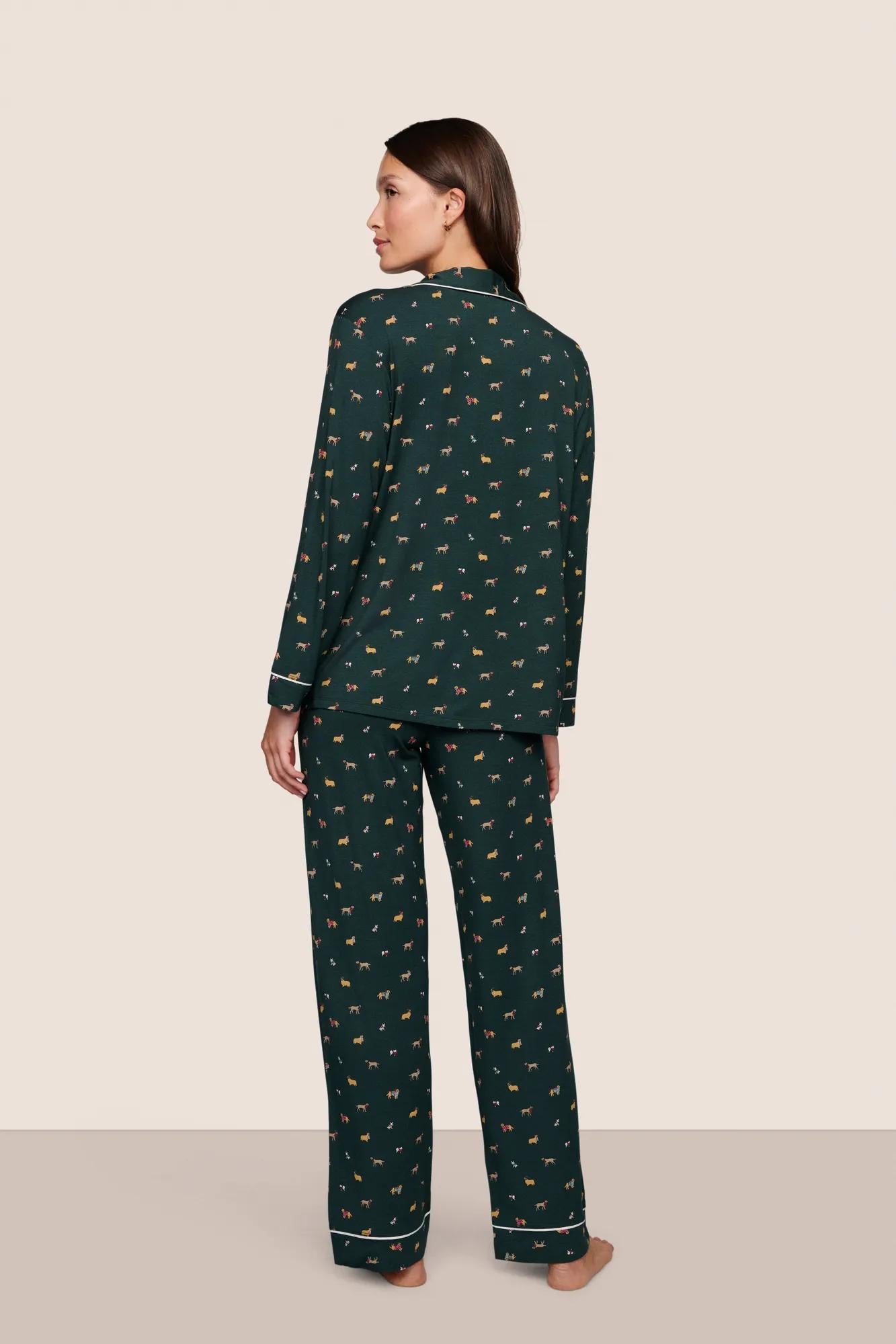 Model is wearing Gisele Printed TENCEL Modal Long PJ Set  in Holiday Dogs Pine/Ivory