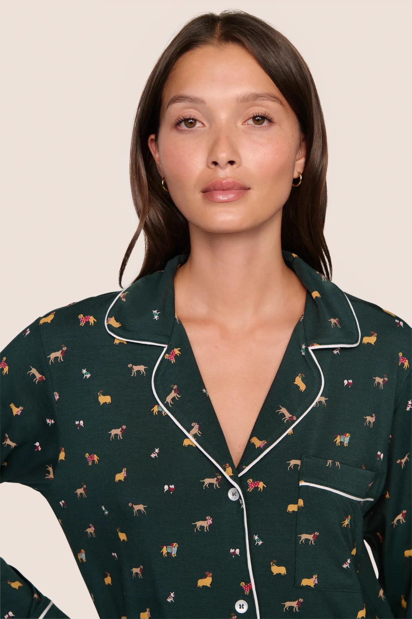 Model is wearing Gisele Printed TENCEL Modal Long PJ Set  in Holiday Dogs Pine/Ivory