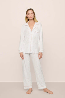 Model is wearing Gisele Printed TENCEL Modal Long PJ Set in SummerDaisyWhite/PaleMauve