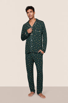 Model is wearing William Printed TENCEL Modal Long PJ Set  in Holiday Dogs Pine/Ivory