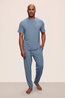 Model is wearing Henry TENCEL Modal Short Sleeve Pant PJ Set in Faded Denim