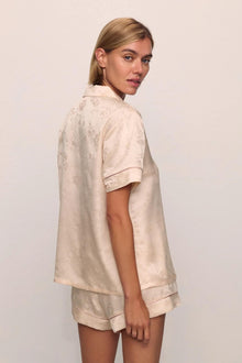 Model is wearing Inez Washable Silk Jacquard Short PJ Set in  Floralvine Peachdust/Palemauve