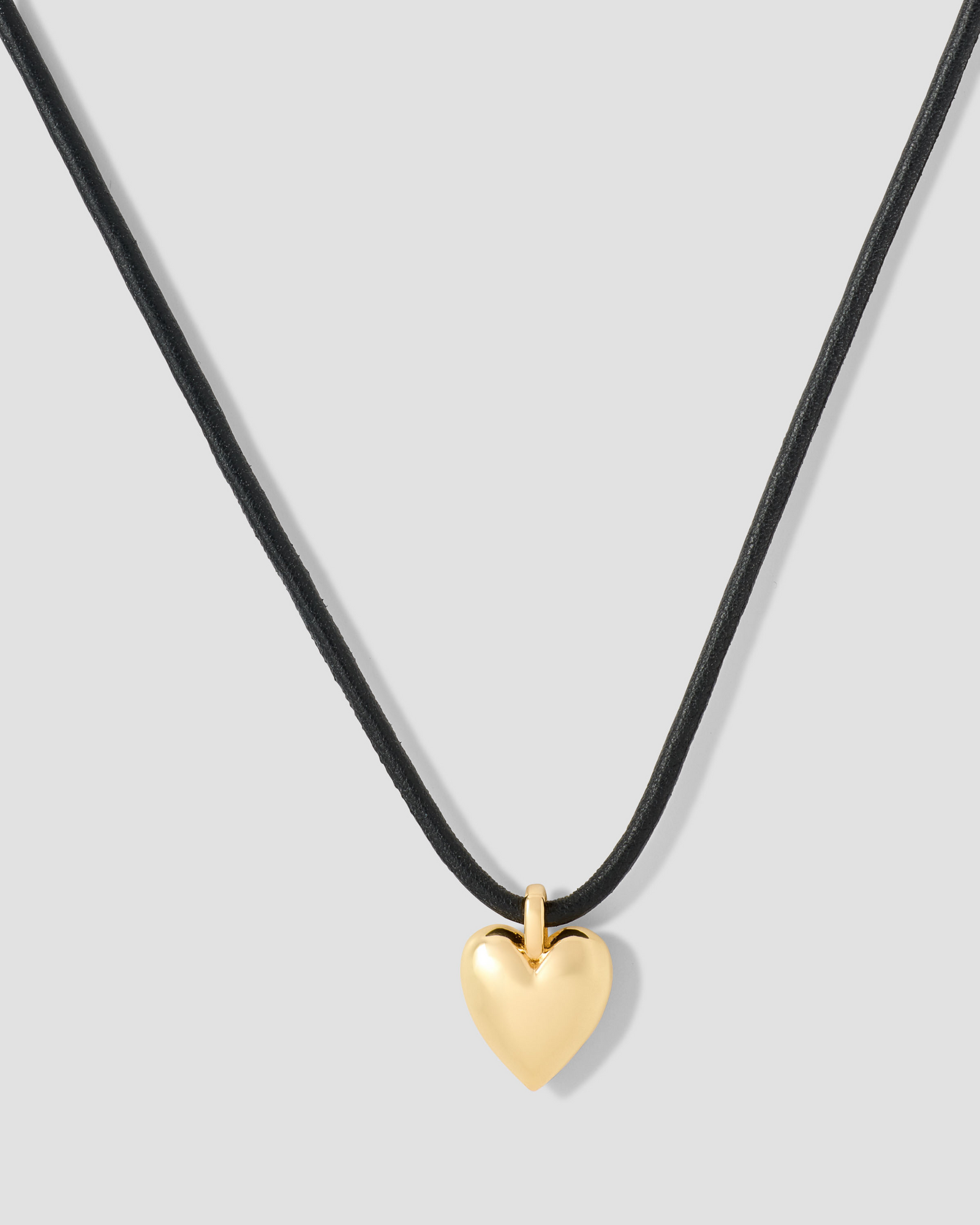 Small Puffy Heart Leather Cord Necklace gold necklace - front view | fine necklaces
