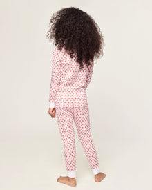 Kid's Pima Snug Fit Pajama Set in Autumn Orchards: two-piece set with long sleeves and pants, featuring a red flower pattern on a white background with solid white cuffs and neckline.
