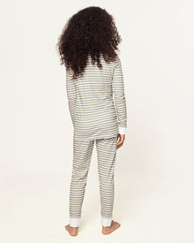 The Kid's Pima Snug Fit Pajama Set in Sage Stripe features green and white horizontal stripes, long sleeves, white cuffs at wrists and ankles, and a small button placket on the shirt. The set is displayed flat on a white background.