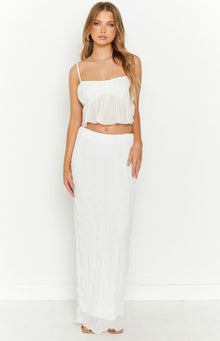 White crinkled maxi skirt with a fitted waist and straight cut, extending to the floor