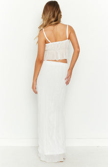 Rear view of a white crinkled maxi skirt with an elasticated waistband and flowy fit