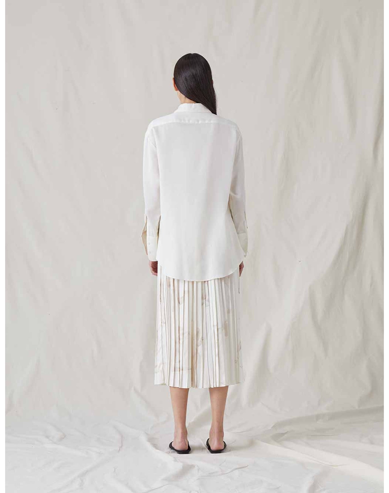 The Pleated Skirt with Painted Figures | Cream / Sepia