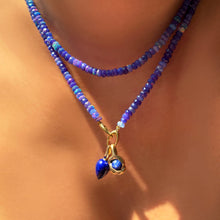 before sunrise faceted opal necklace star sapphire knot charm and lapis drop charm