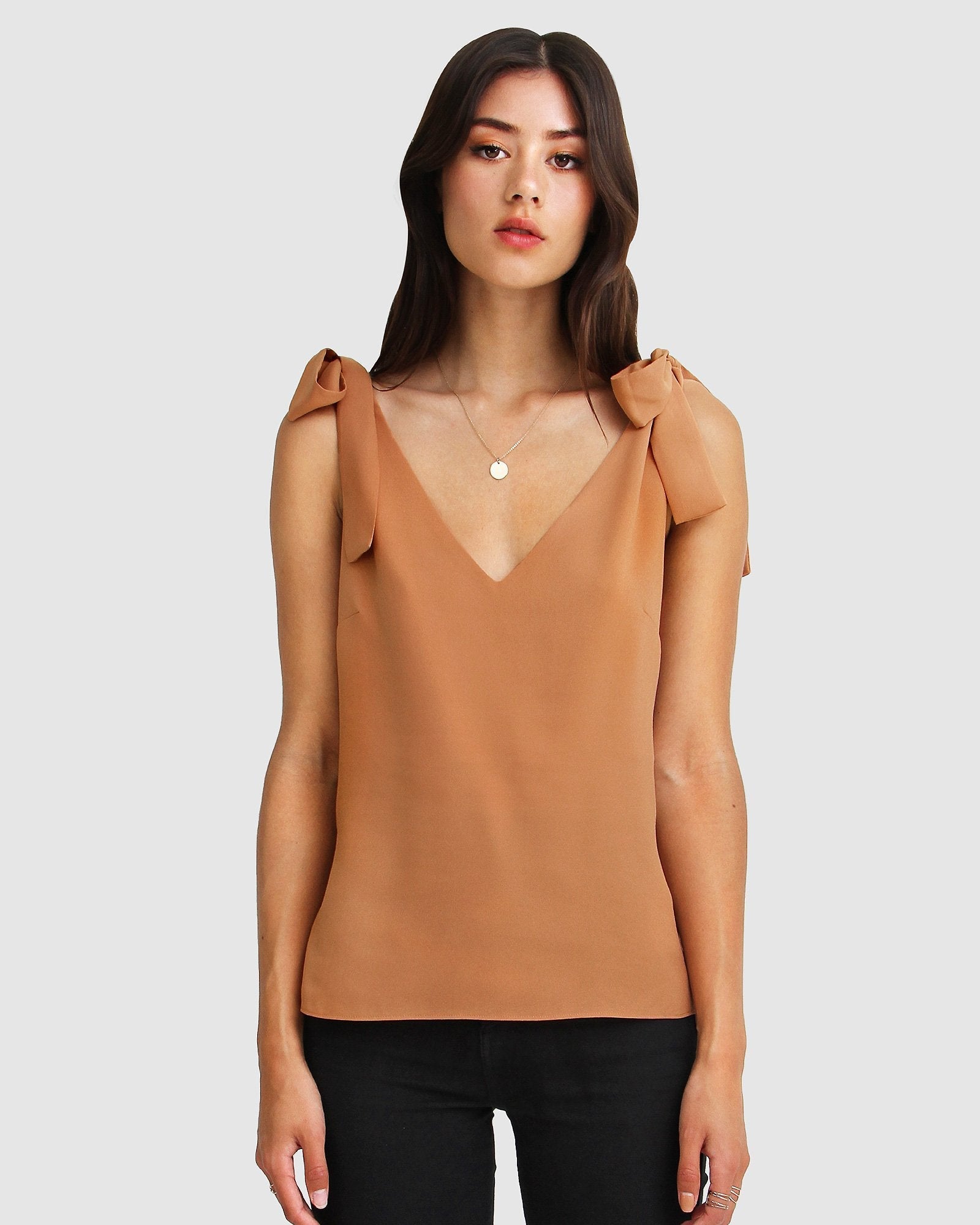 feel-for-you-camel-v-neck-top-front-untucked_e3018cd7-5b98-4b2a-a0d9-e30196ecf796.jpg