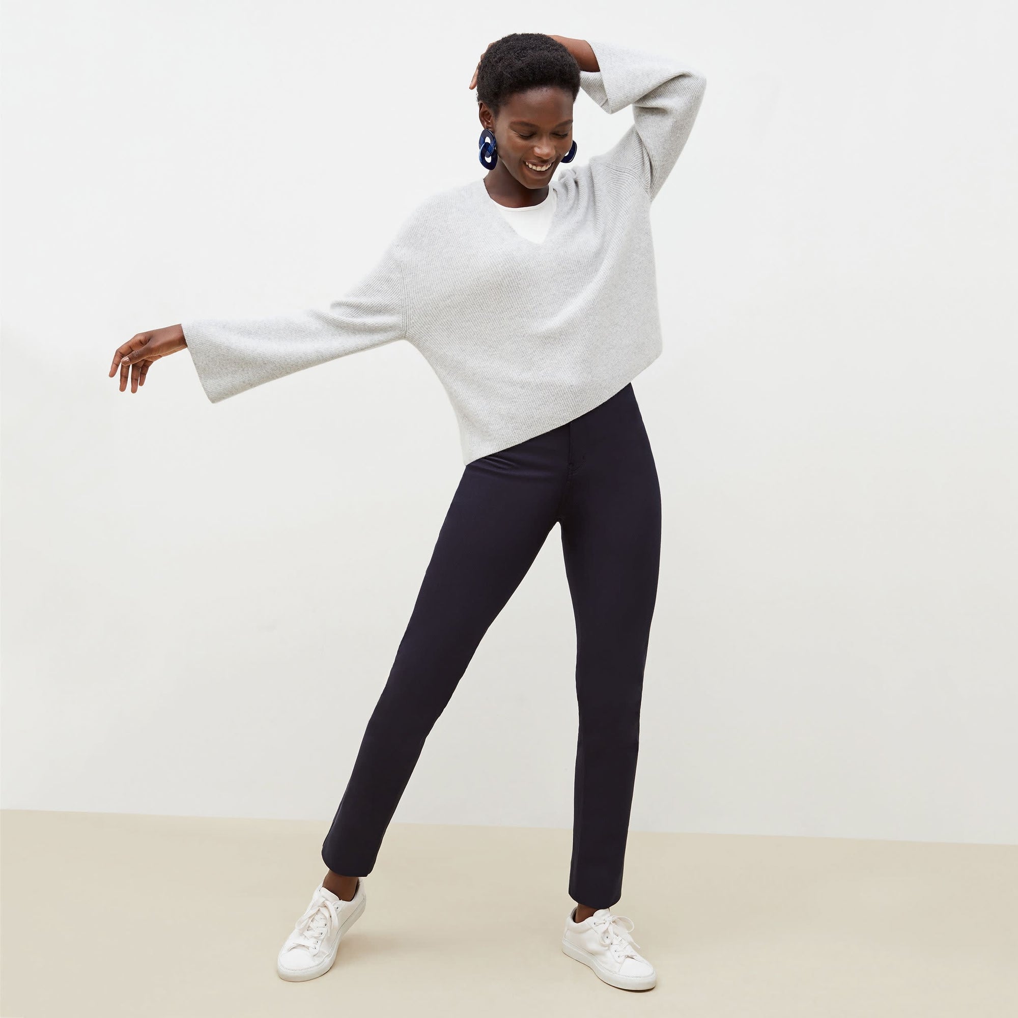 Front image of a woman standing wearing the Hockley pant in ink 