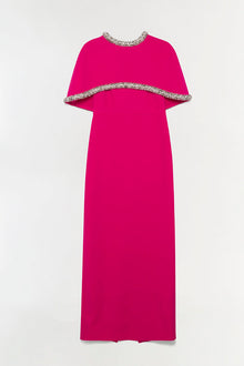 Hot pink floor-length gown with detached cape featuring jeweled trim around neckline and cape edge.