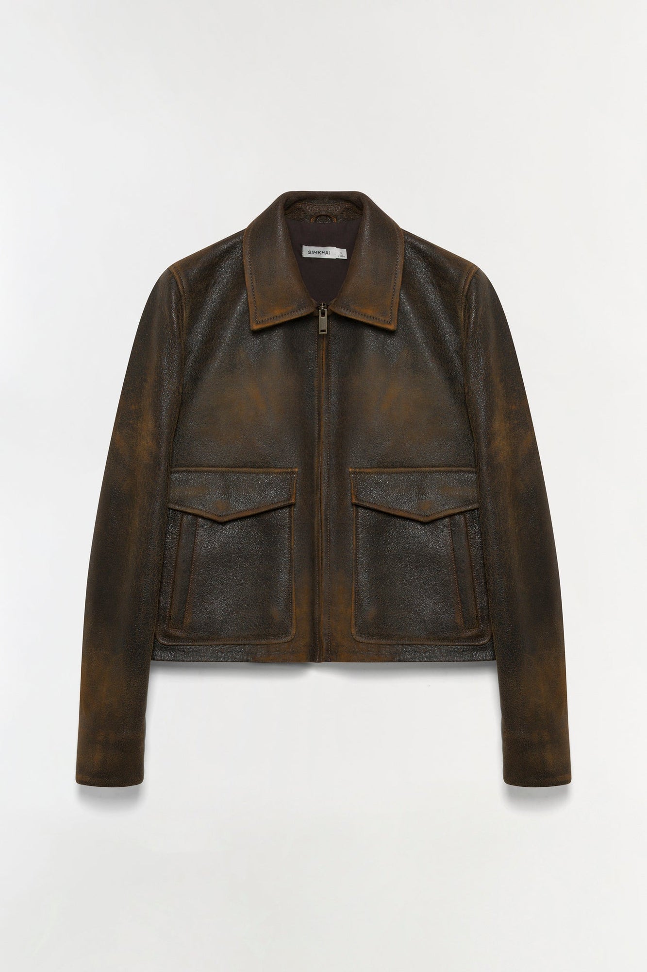 Distressed brown leather jacket with spread collar, front zip closure, and two chest patch pockets.