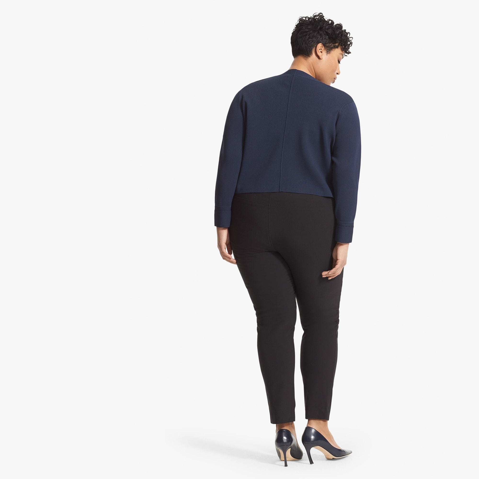 front image of a woman wearing the sant ambroeus jardigan in navy | Exclude
