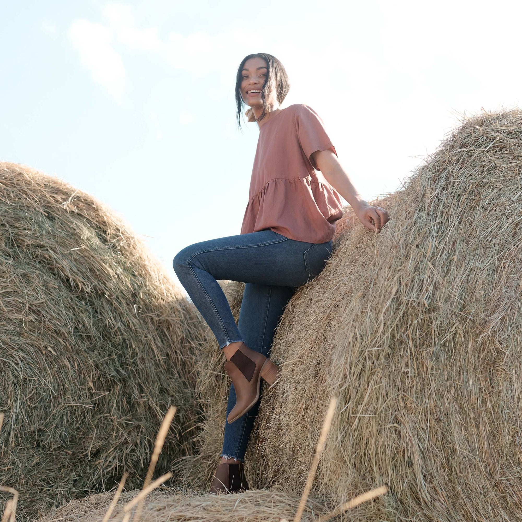Image 1 of the Heeled Chelsea Commuter Boot Brown on model